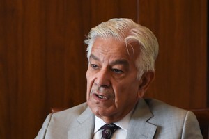 Pakistan defense minister says military incursion by India is imminent