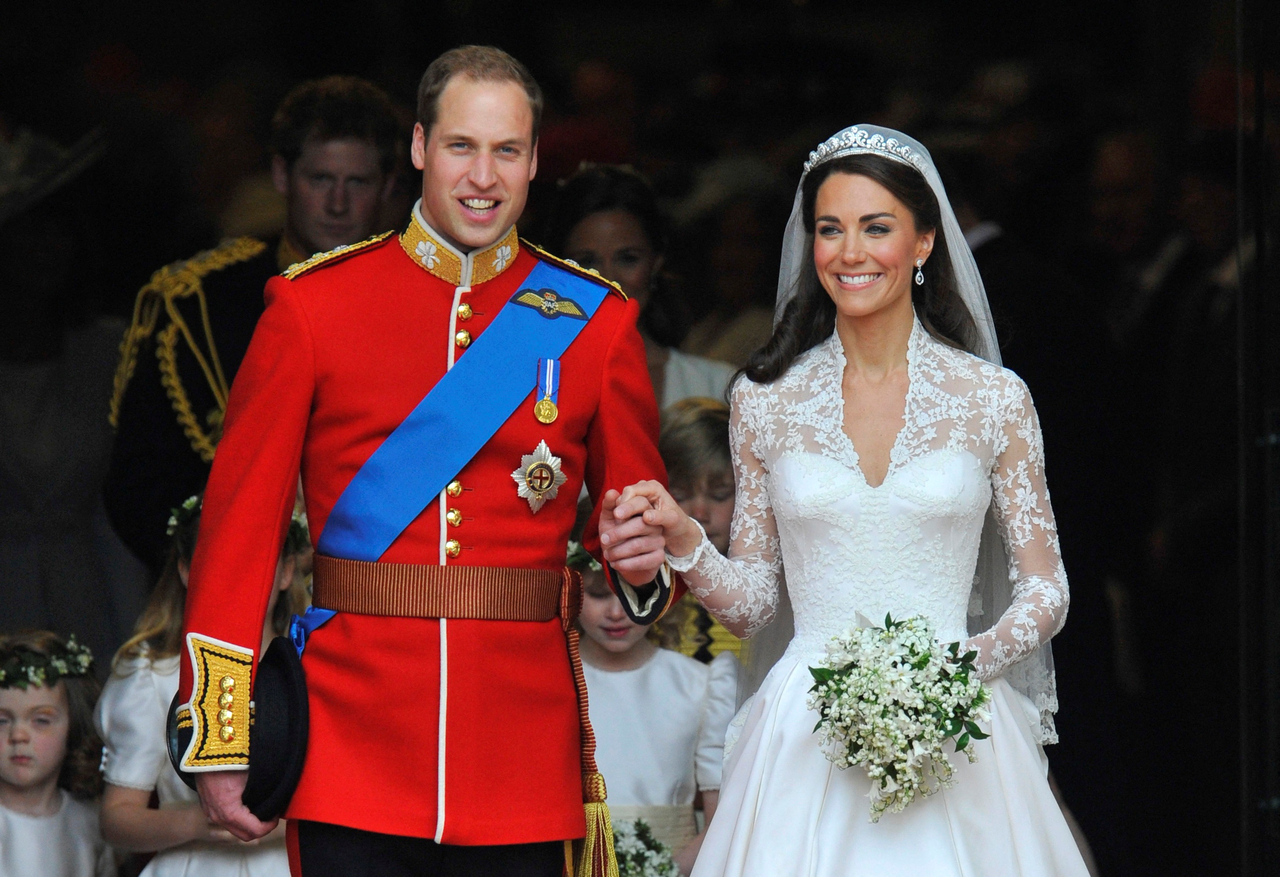 Britain's Prince William and Catherine, Duchess of Cambridge, are seen walking after their wedding ceremony at Westminster Abbey, in London, April 29, 2011.   (Reuters-Yonhap)