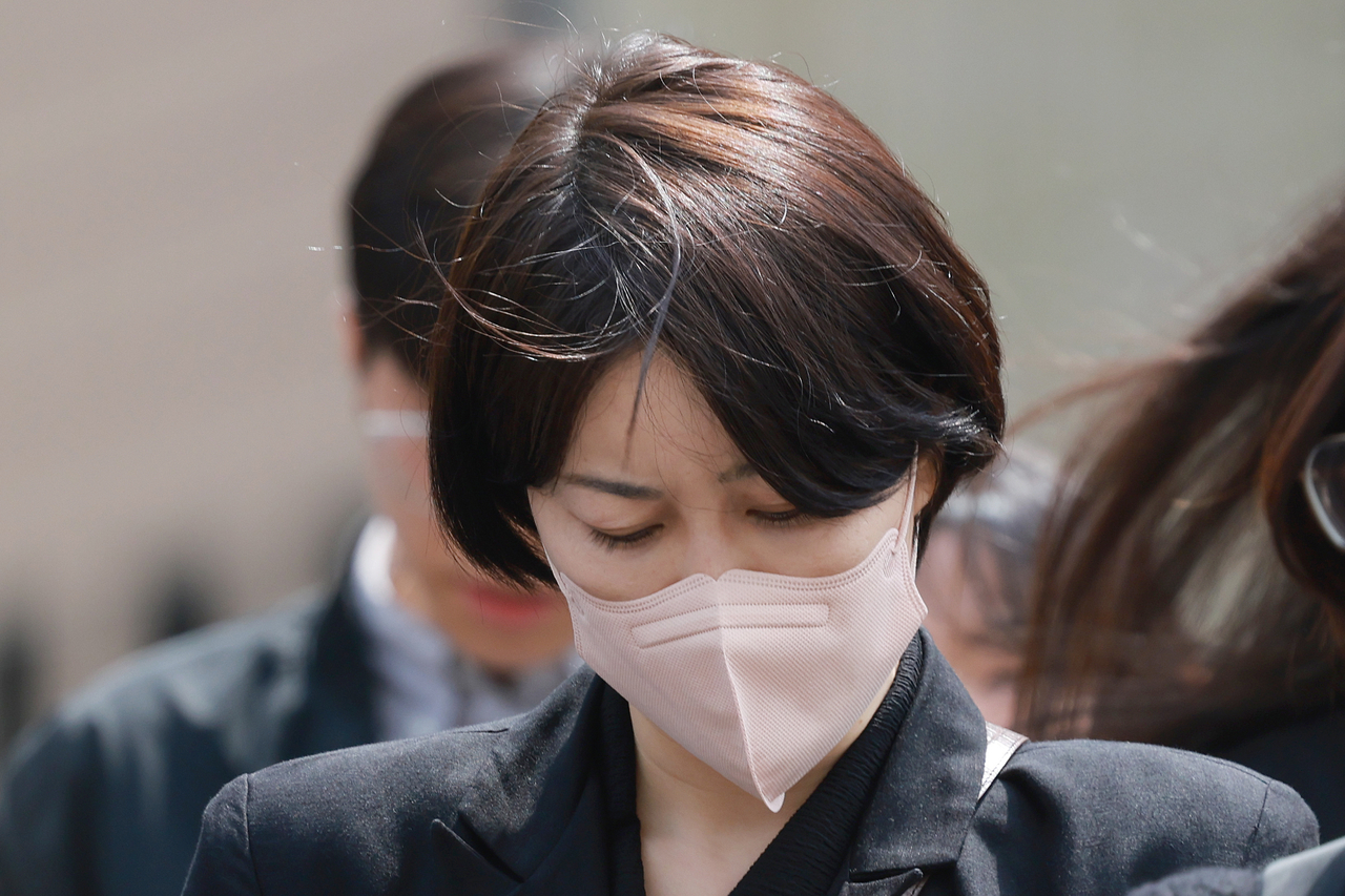 Moon Da-hye, daughter of former President Moon Jae-in, leaves the Seoul Western District Court, April 17. (Yonhap)