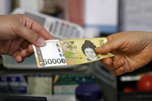 Won climbs on softer US tariffs, Taiwan currency surge