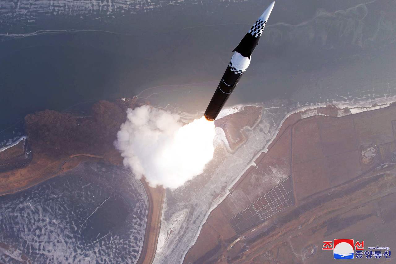 A new intermediate-range ballistic missile tipped with a hypersonic warhead is launched on Jan. 6, in this file photo. (Korean Central News Agency via Yonhap)