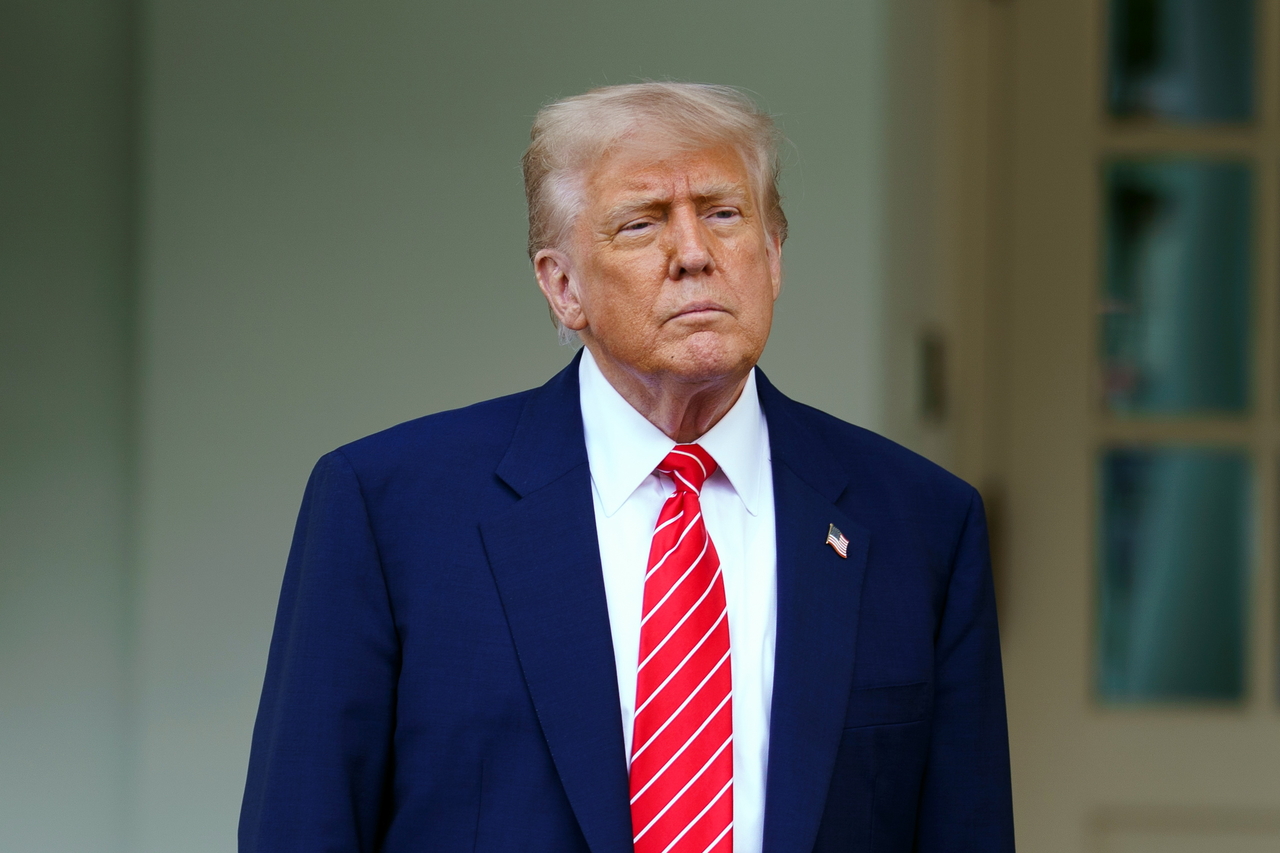 US President Donald Trump speaks to the media outside the West Wing of the White House in Washington on Thursday. (EPA-Yonhap)