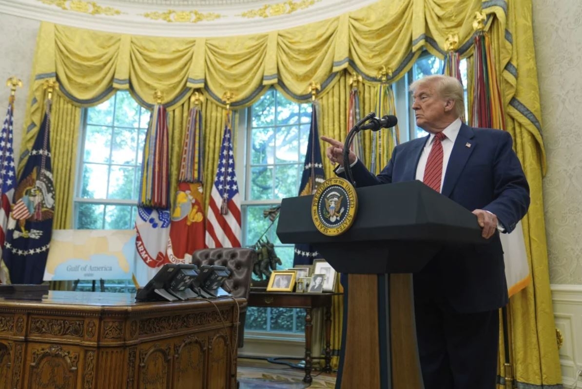 President Donald Trump speaks to reporters after David Perdue was sworn in as U.S. Ambassador to China during a ceremony in the Oval Office of the White House, Wednesday, May 7, 2025, in Washington. (AP Photo/Mark Schiefelbein)