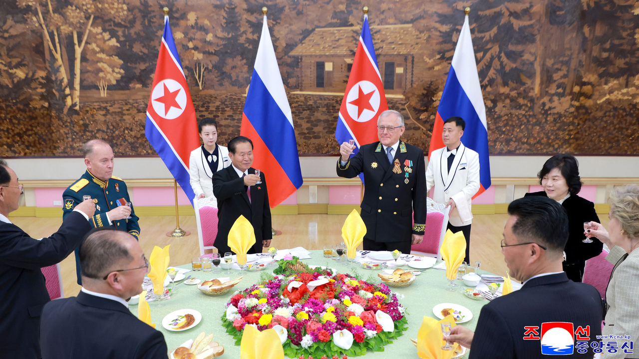 This image, published on Thursday, shows a banquet hosted by Russia the previous day in Pyongyang to mark the 80th anniversary of Russia's Victory Day. (KCNA)