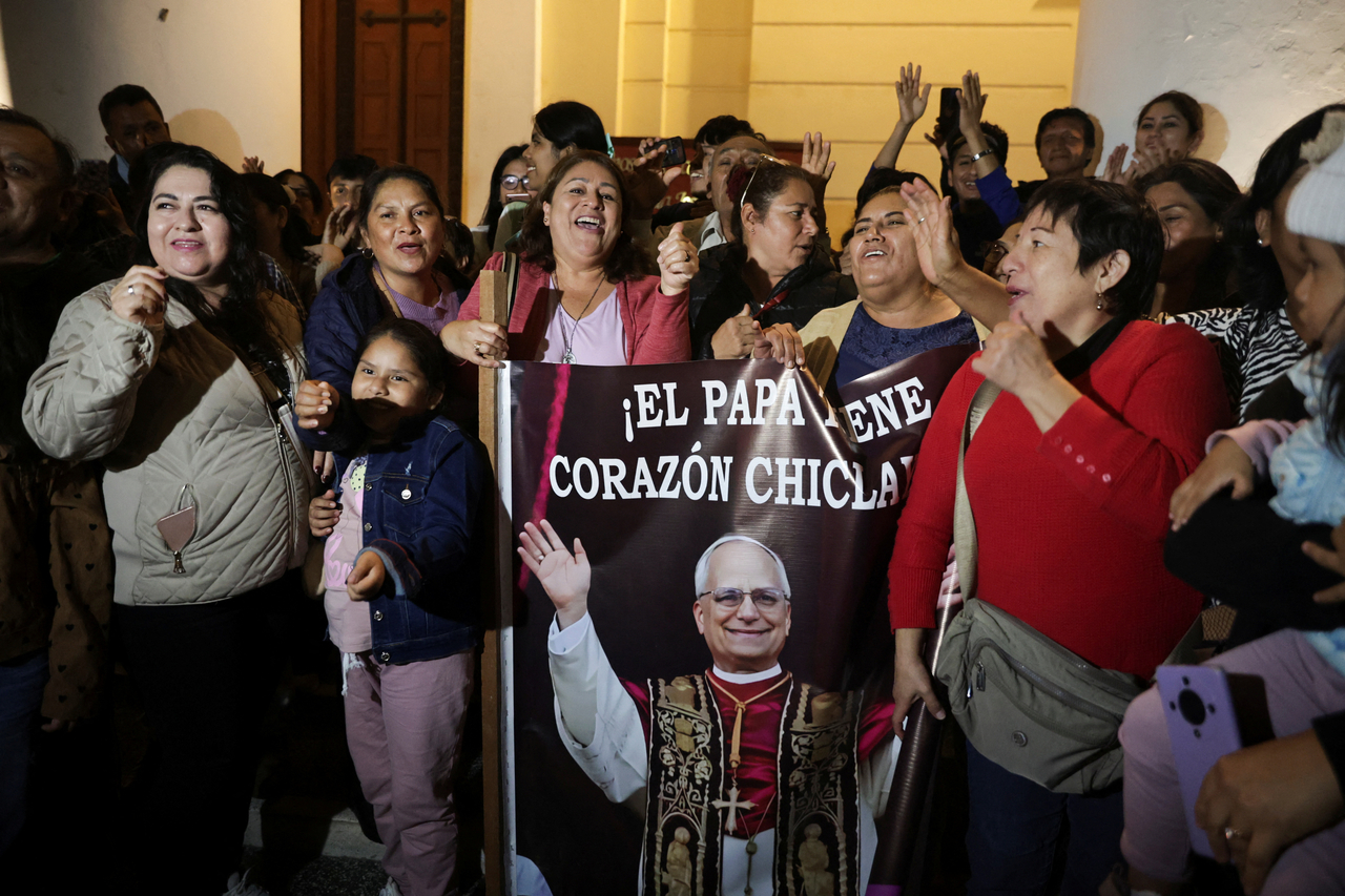 People celebrate at the Cathedral of Saint Mary, on the day of the election of Pope Leo XIV, in Chiclayo, Peru May 8, 2025. (Reuters-Yonhap)