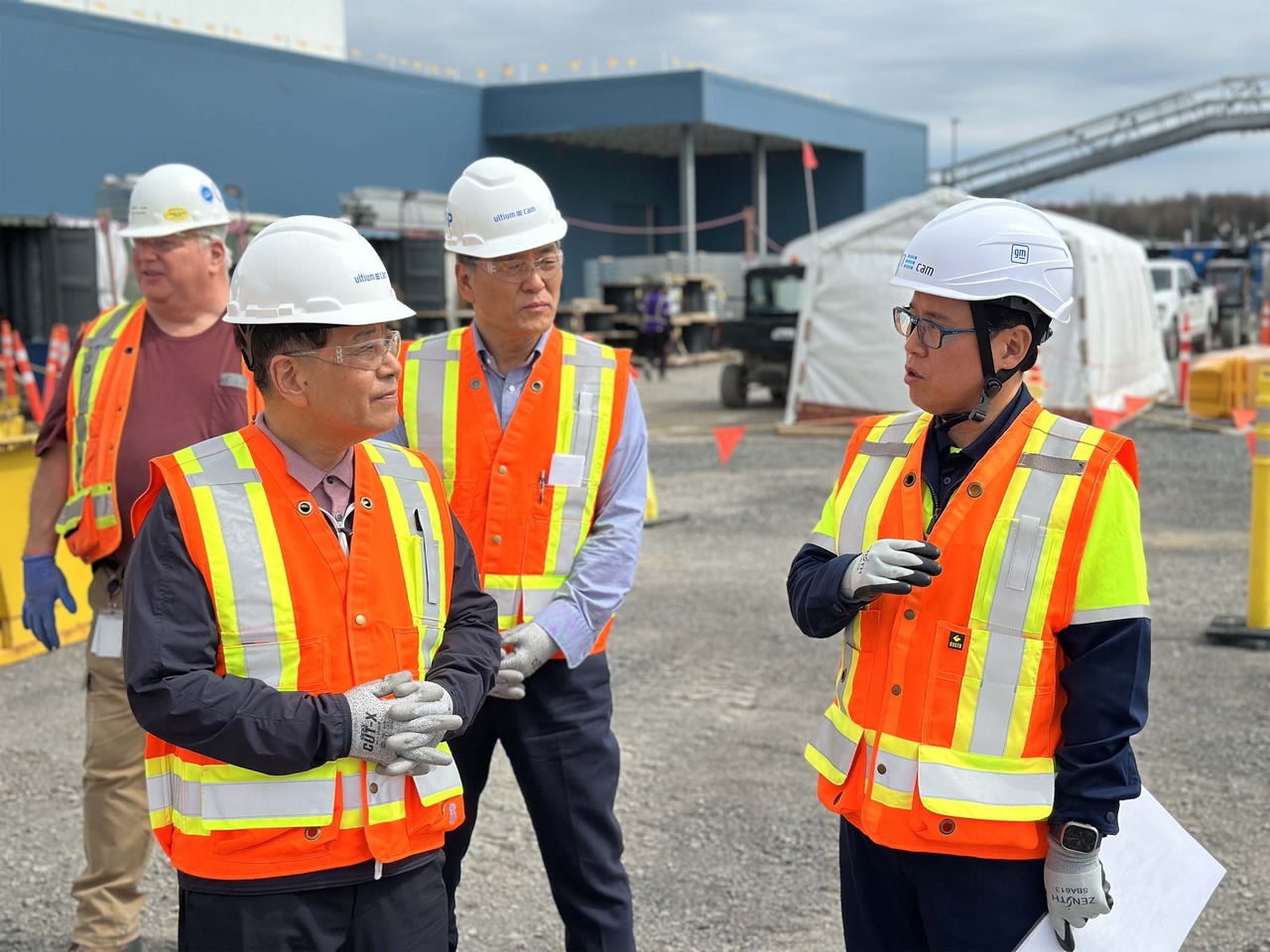 Posco Group Chair Chang In-hwa (second from left) tours Ultium CAM's plant under construction in Quebec City on April 29. (Posco Future M)