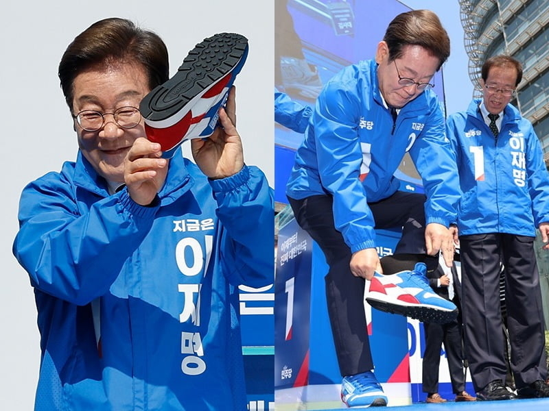 이재명 더불어민주당 대선 후보가 6·3 대통령선거 공식 선거운동 첫날인 12일 서울 광화문 청계광장에서 열린 출정식 및 첫 유세에서 운동화를 신고 있다. 연합뉴스