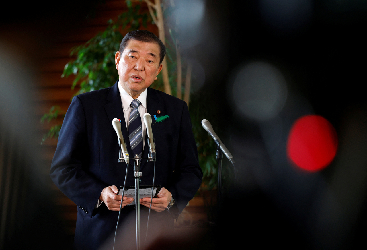 Japanese Prime Minister Shigeru Ishiba reacts as he speaks to reporters after a Japanese negotiator held ministerial talks at the White House regarding US tariffs, at the prime minister?s official residence in Tokyo, Japan, on April 17. (Reuters)