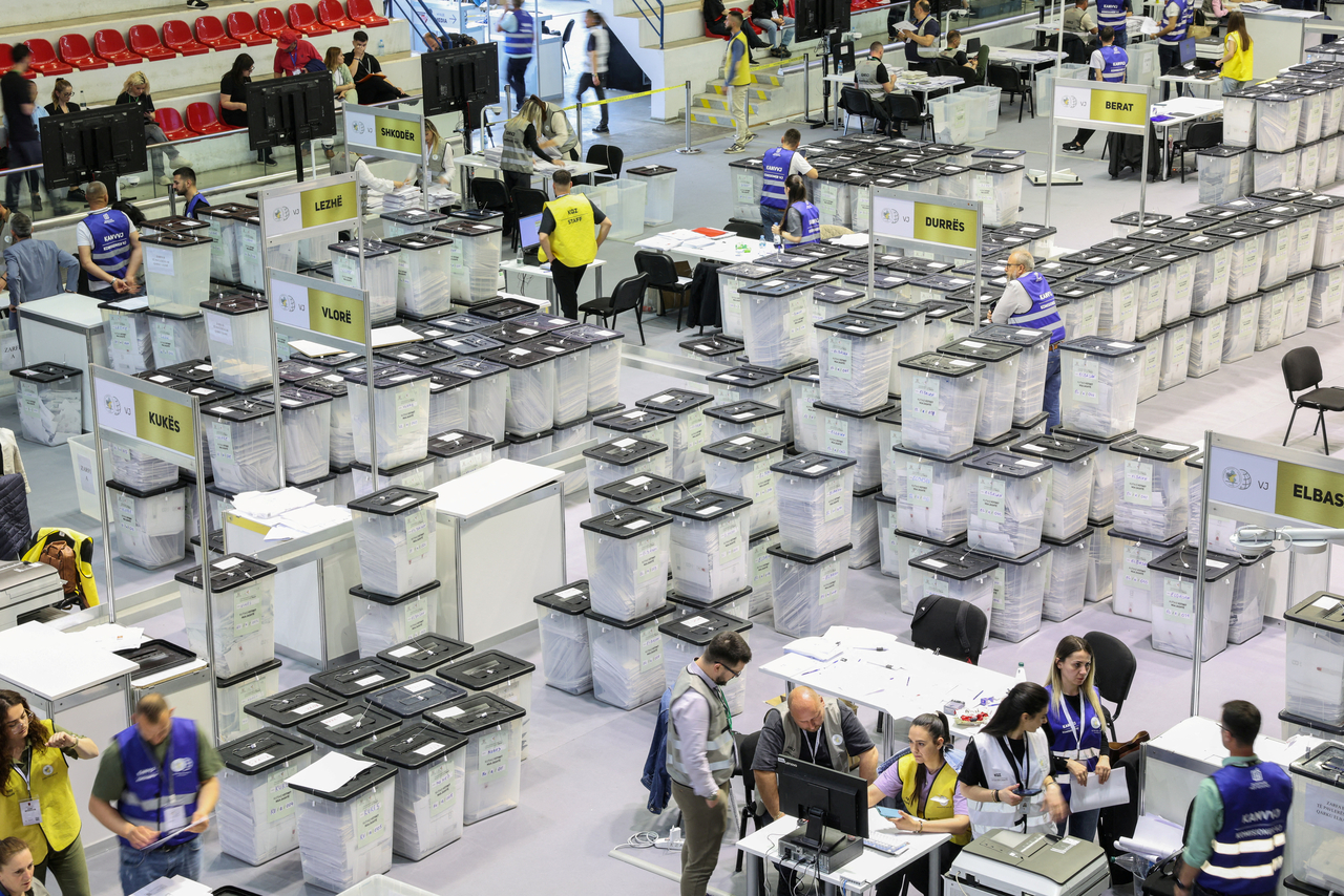 Officials tabulate ballots in a counting center after an election in Tirana, Albania, Monday. (Reuters-yonhap)