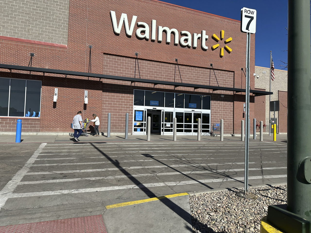 Shoppers outside a Walmart store on Feb. 7 in Englewood, Colorado, US (AP)
