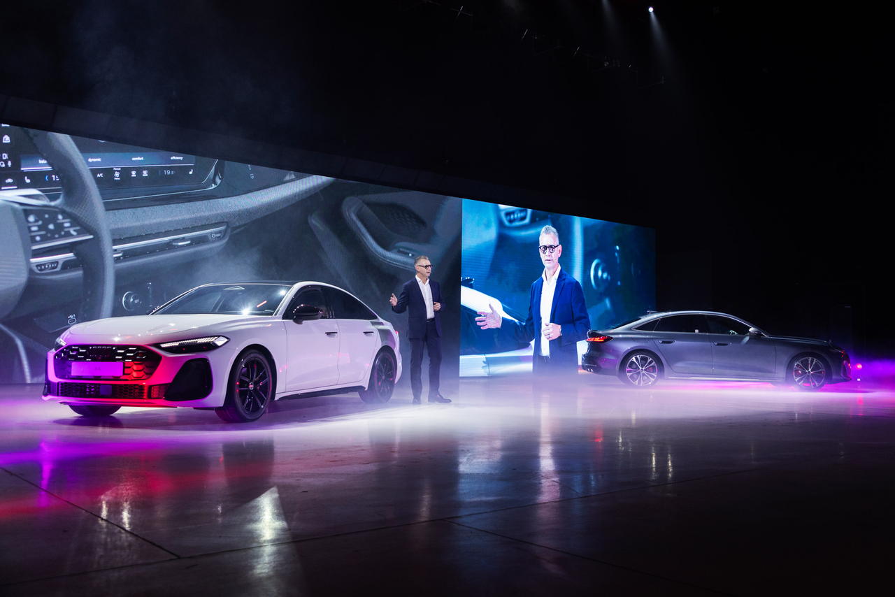 Steve Cloete, executive director of Audi Korea, introduces the new A5 (left) and its performance-enhanced S5 trim during a media preview event held Thursday in Gimpo, Gyeonggi Province. (Audi Korea)