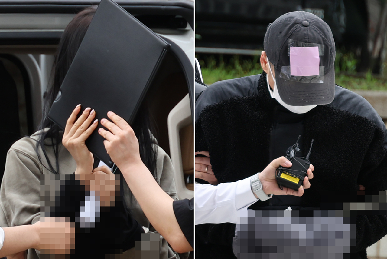 축구 국가대표팀 주장 손흥민의 아이를 임신했다고 주장하며 손씨에게 돈을 뜯어내려 한 20대 여성 양모씨(왼쪽)와 40대 남성 용모씨가 17일 영장실질심사를 받기 위해 서울중앙지법에 들어서고 있다. [연합]