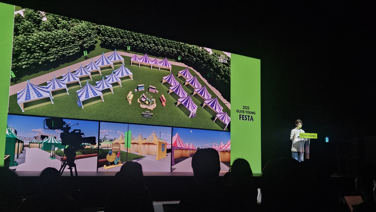 Lee Eun-jeong, head of Olive Young’s Brand Creative Center, presents an overview of 2025 Olive Young Festa during a press event held Wednesday at Nodeul Island in central Seoul. (Kim Hae-yeon/ The Korea Herald)