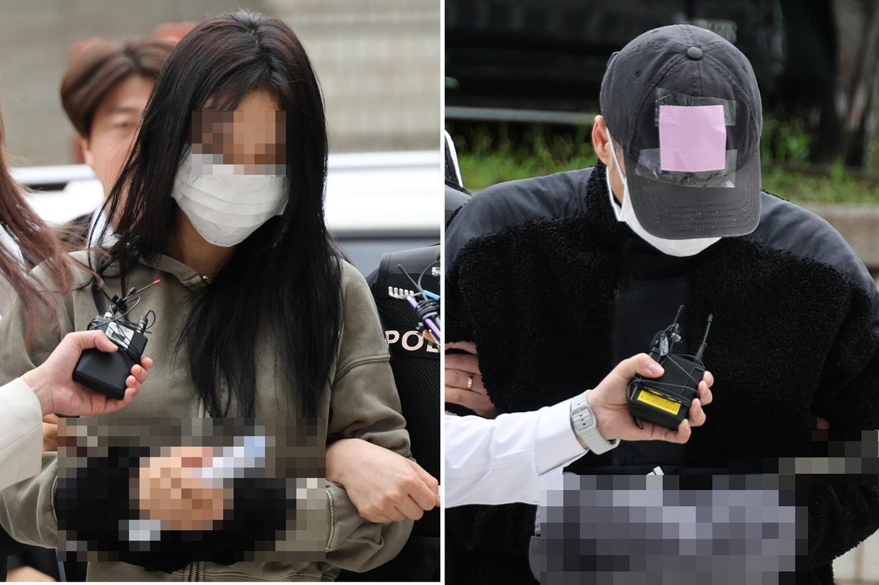 축구 국가대표팀 주장 손흥민의 아이를 임신했다고 주장하며 손씨에게 돈을 뜯어내려 한 20대 여성 양모씨(왼쪽)와 40대 남성 용모씨가 17일 영장실질심사를 받기 위해 서울중앙지법에 들어서고 있다. [연합]