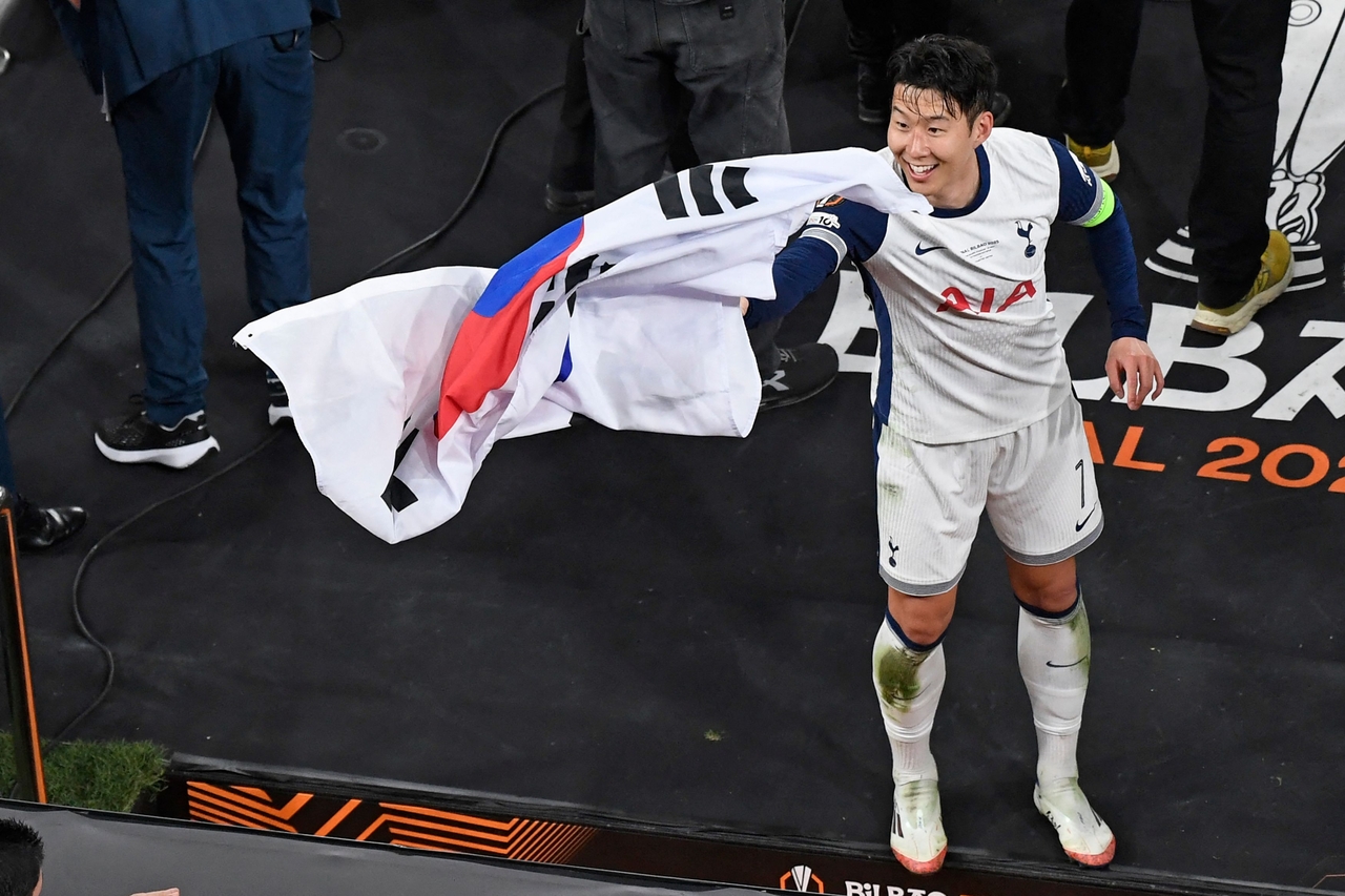 Tottenham Hotspur's South Korean forward Son Heung-Min celebrates after the UEFA Europa League final football match between Tottenham Hotspur and Manchester United at the San Mames stadium in Bilbao on May 21. (AFP)