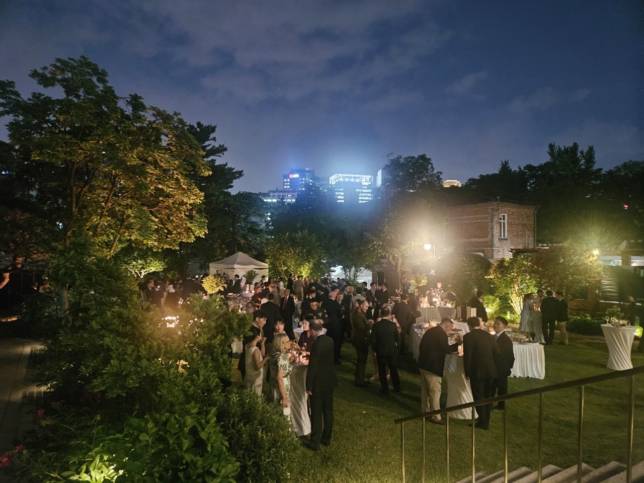 Attendees gather at the British Embassy Residence Garden to celebrate King Charles III's birthday on Thursday in Jung-gu, Seoul (Park Yuna/The Korea Herald)