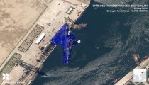 Satellite photo shows N. Korea's new warship capsized at shipyard