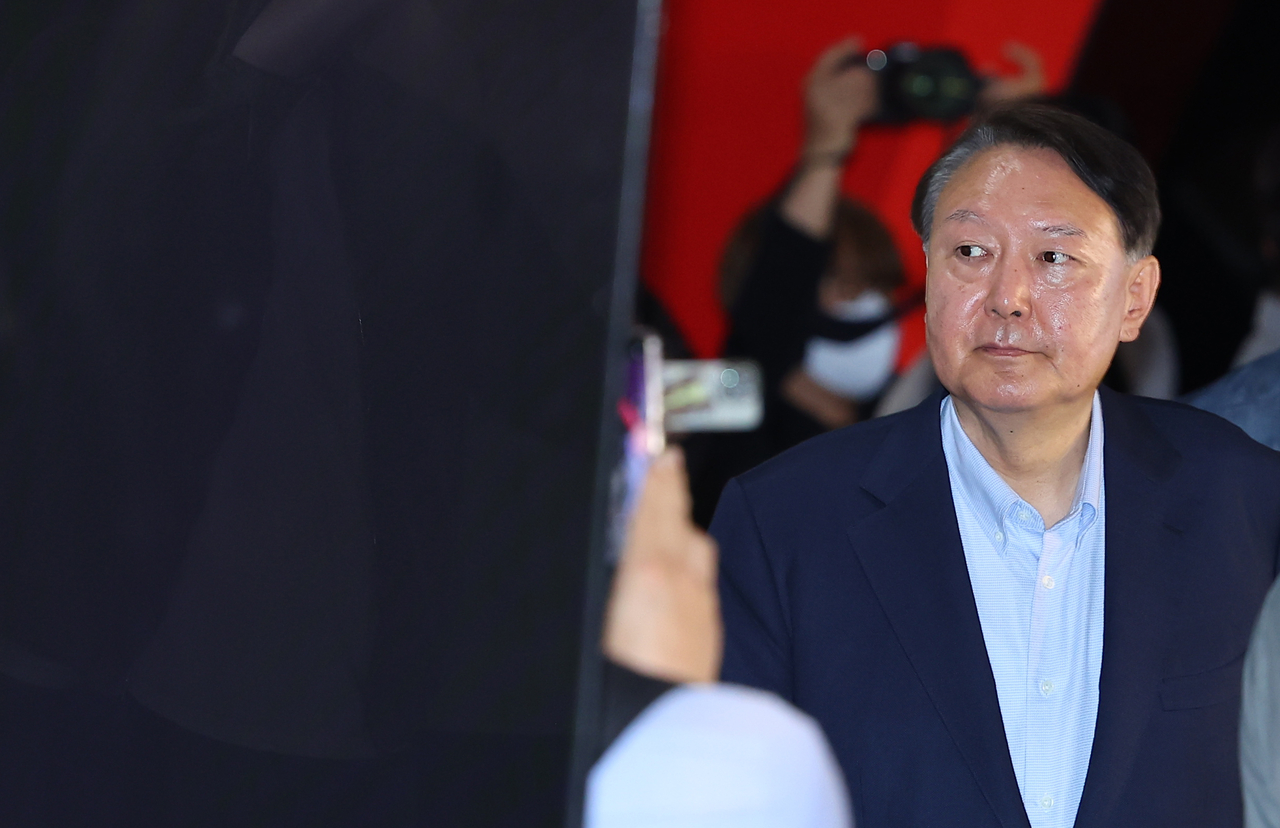 Former President Yoon Suk Yeol leaves a movie theater in Seoul after watching a documentary film on election fraud on Wednesday. (Yonhap)