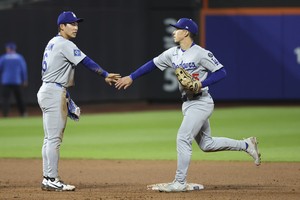 Dodgers' Kim Hye-seong gets hit after entering as pinch runner