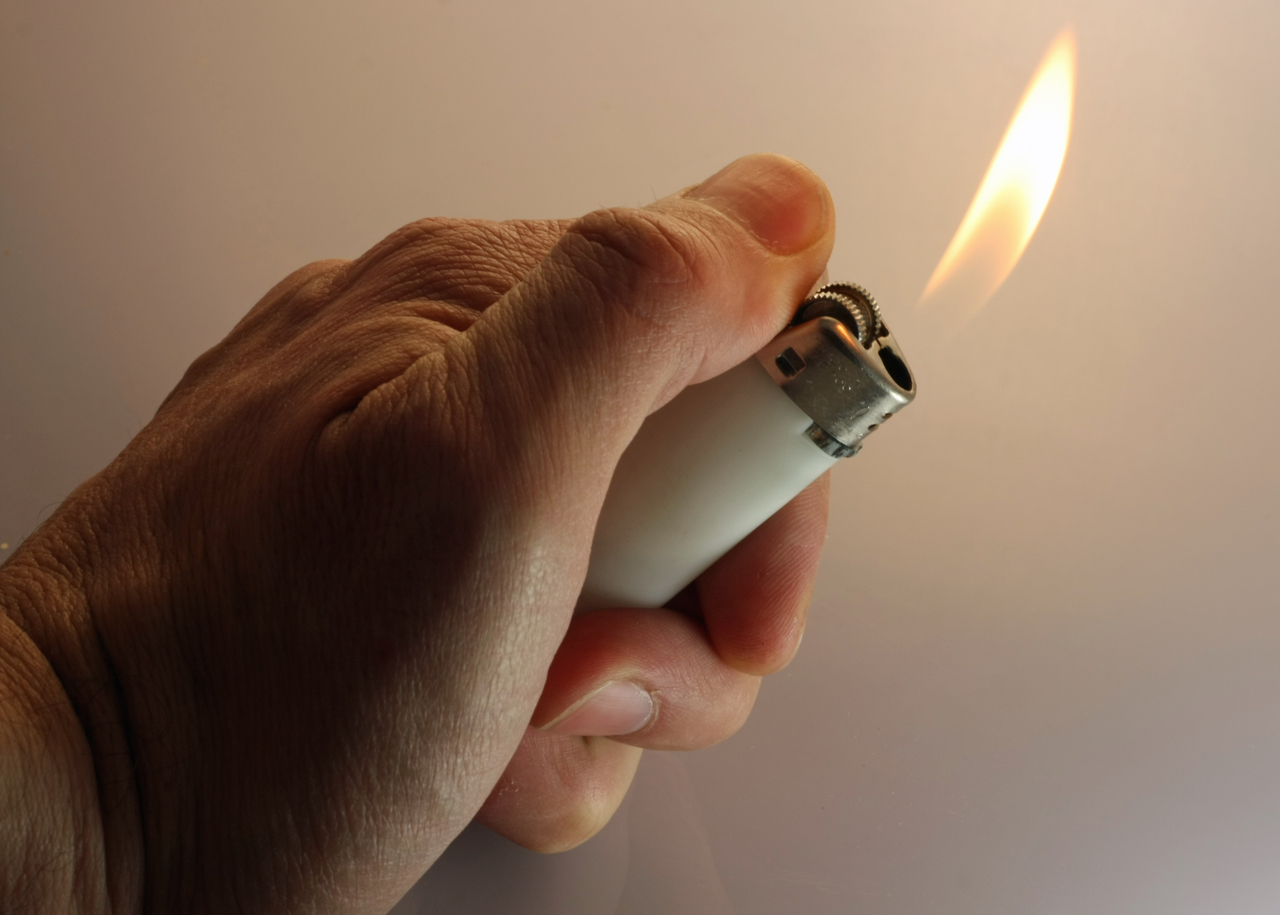 A woman in a wheelchair suffered severe burns while using a lighter to open a food delivery package on Sunday, according to the Gwangju Fire Station. (123rf)