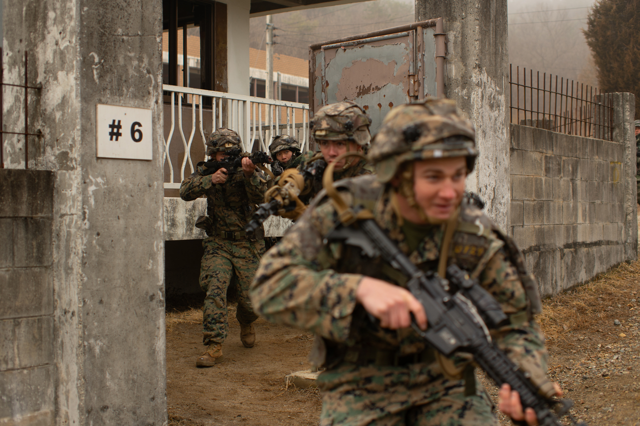 US and South Korean Marines take part in urban terrain training during the Korean Marine Exchange Program at the Rodriguez Live Fire Complex in Pocheon, Gyeonggi Province, March 13. (US Marine Corps)
