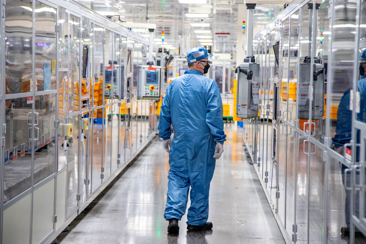 An LG Energy Solution employee inspects the battery production process at the company's manufacturing plant in Holland, Michigan. (LG Energy Solution)