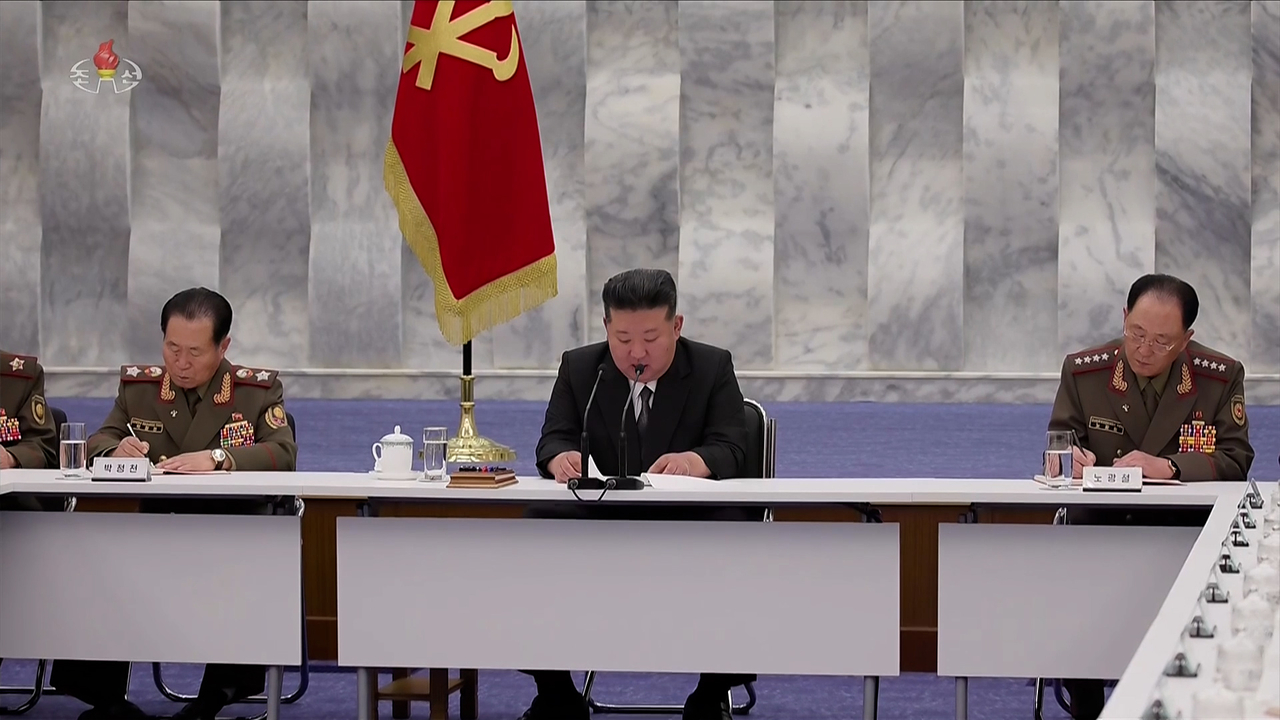 In this screencaptured photo from the North Korean Central Television, North Korean leader Kim Jong-un presides over an enlarged meeting of the Central Military Commission of the ruling Workers' Party of Korea Wednesday. (Yonhap)