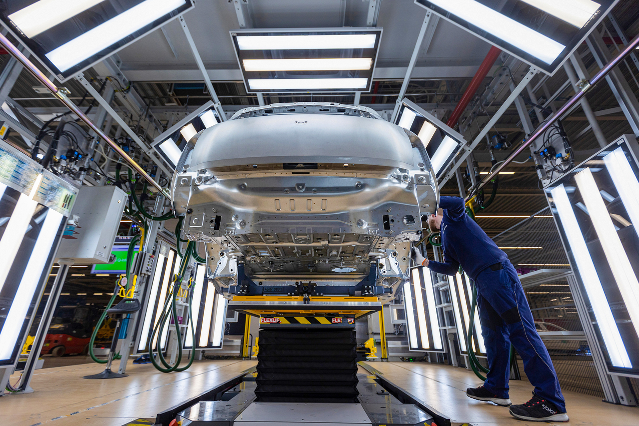 A worker inspects the body of a Mini Countryman automobile at the body shop in the BMW Group factory in Leipzig, Germany, March 21, 2024. Bloomberg
