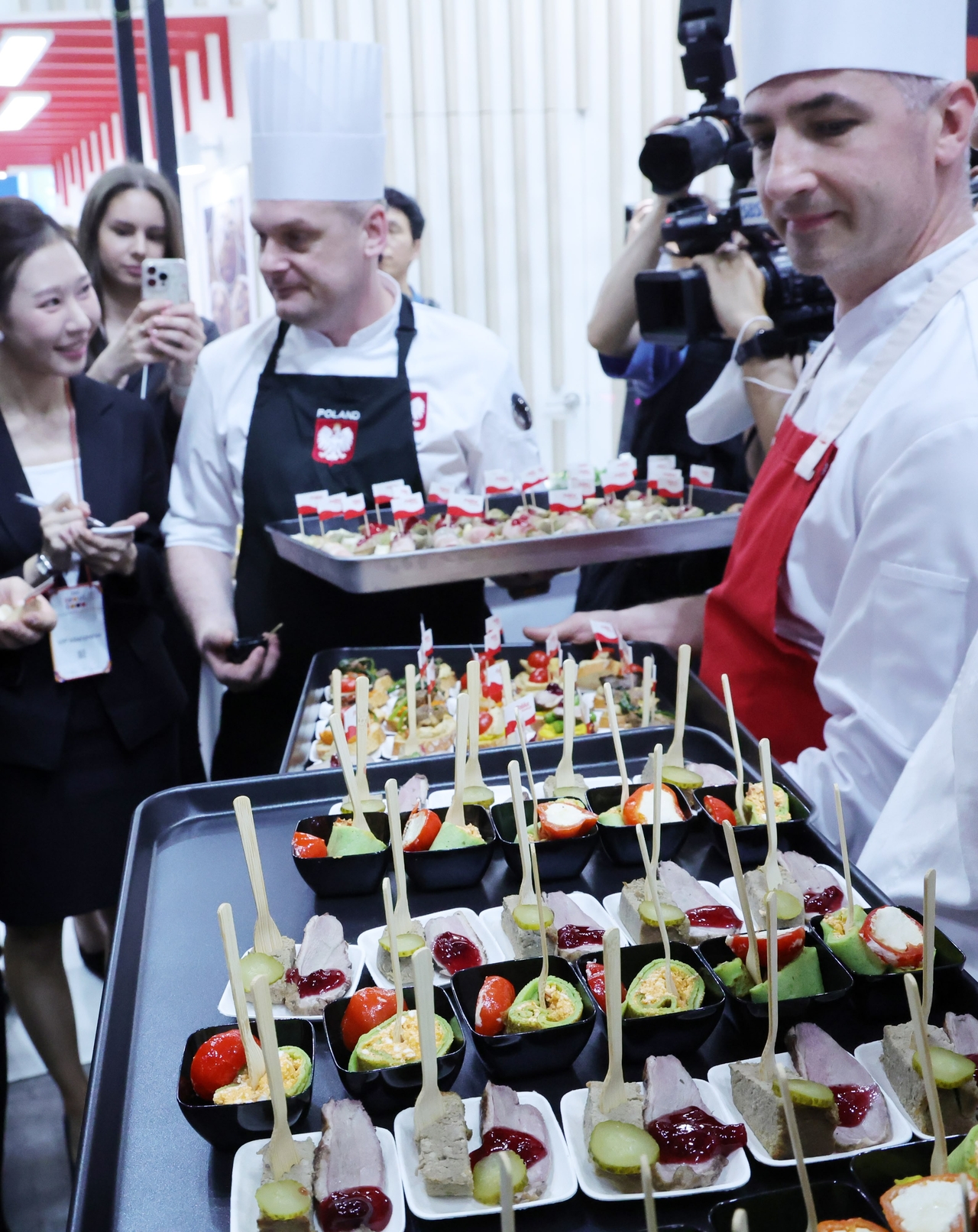 Polish chefs present their national cuisine during Seoul Food 2025 at Kintex in Goyang, Gyeonggi Province, Tuesday. (Yonhap)