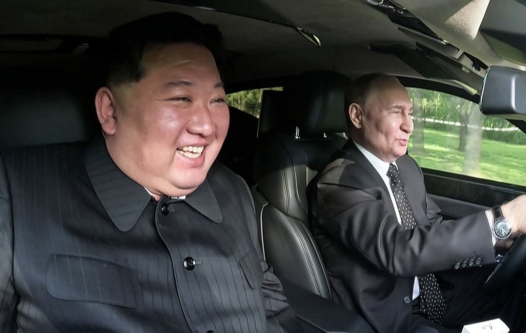 North Korean leader Kim Jong-un (L) sits next to Russian President Vladimir Putin in an Aurus Senat limousine that the latter gifted to him while driving on the grounds of the Kumsusan State Guest House in Pyongyang on June 19, 2024, in this file photo provided by the North's official Korean Central News Agency the following day. (For Use Only in the Republic of Korea. No Redistribution) (Yonhap)