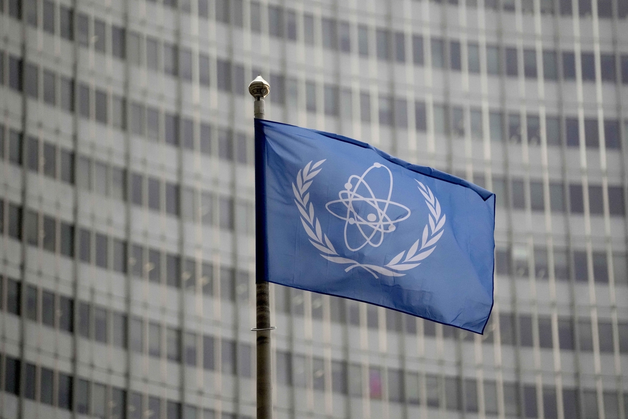 FILE - The flag of the International Atomic Energy Agency flies in front of its headquarters during an IAEA Board of Governors meeting in Vienna, Austria, Wednesday, Nov. 22, 2023. (AP-Yonhap)