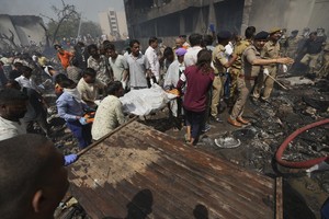 London-bound Air India flight with more than 240 aboard crashes after takeoff from Ahmedabad, India