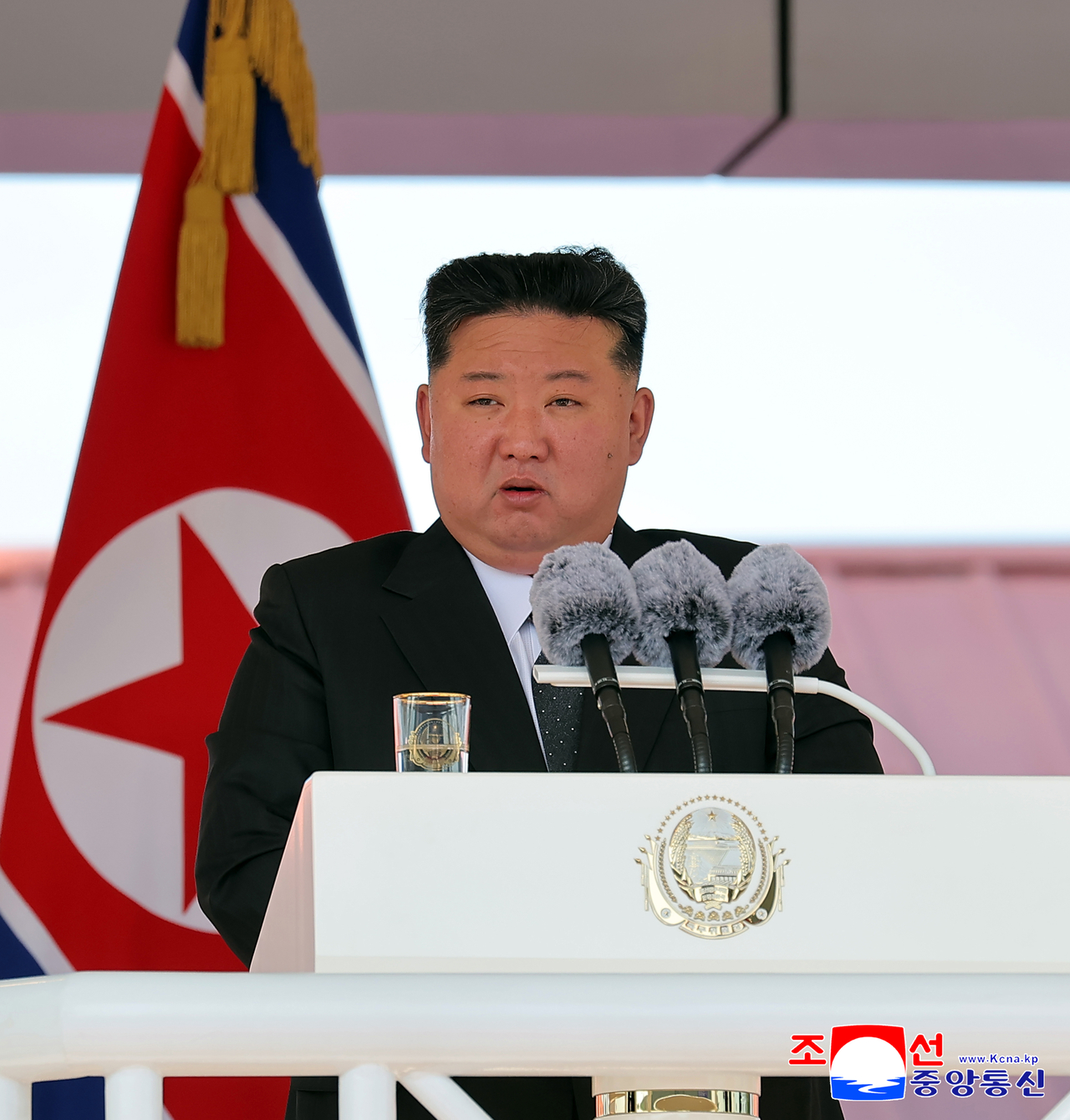 North Korean leader Kim Jong-un speaks during the launching ceremony of the 5,000-ton destroyer Kang Kon at a shipyard in the northeastern city of Rajin on June 12, 2025, 23 days after its first launch attempt, in this photo released by the North's official Korean Central News Agency the next day. (Yonhap)