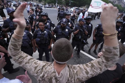 Trump's military parade steps off after day of protests against him