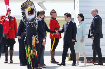 Lee-Trump talks off due to US leader's early G7 exit