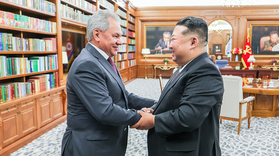 North Korean leader Kim Jong-un meets with Russian Security Council Secretary Sergei Shoigu, who visited North Korea on June 4 on behalf of President Vladimir Putin. (Yonhap)