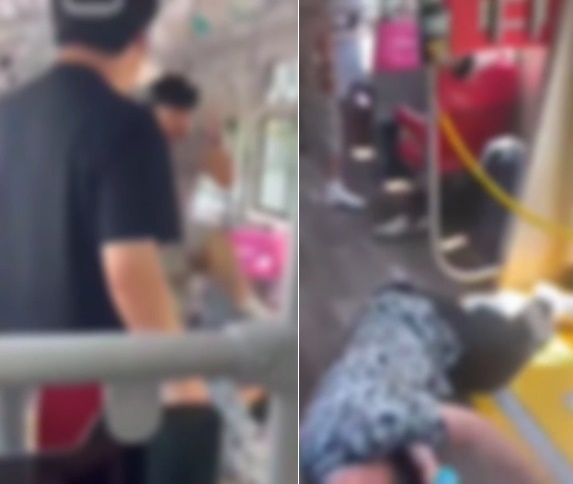 A man in his 20s kicks an elderly man on a bus, knocking him to the ground. (Screenshot from Bobaedream video)