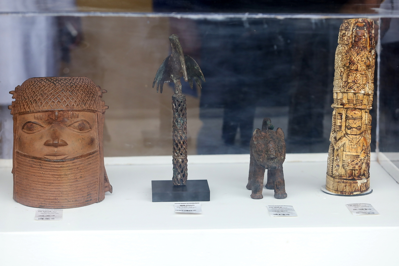 Looted Benin Bronzes are displayed at a handover ceremony held at the Nigeria National Museum in Lagos, Nigeria, Saturday.    EPA-Yonhap