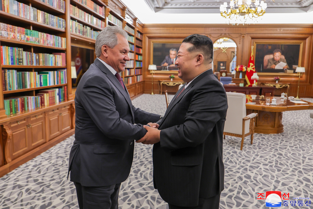 North Korean leader Kim Jong-un (right) meets with Russia's Security Council Secretary Sergei Shoigu in Pyongyang on June 4, 2025, in this photo released by the North's official Korean Central News Agency the next day. The two sides discussed cooperation in various fields and exchanged views on the situation surrounding the Ukrainian crisis and the Korean Peninsula. (Yonhap)