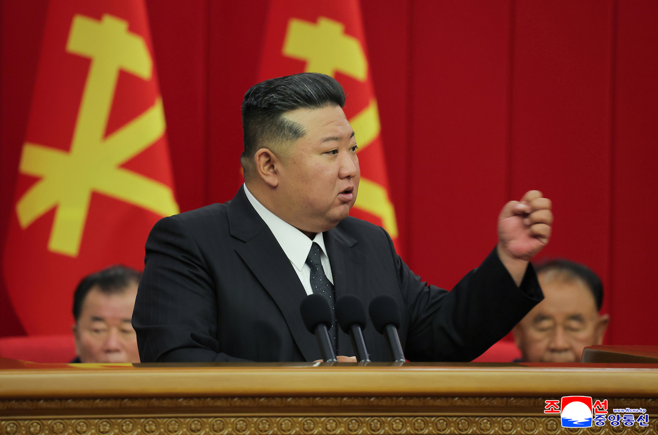 North Korean leader Kim Jong-un speaks during an enlarged meeting of the 12th plenary meeting of the Eighth Central Committee of the Workers' Party of Korea in Pyongyang, in this undated photo released by the North's official Korean Central News Agency on Tuesday. The three-day plenary meeting, held from June 21-23, was convened to conduct the interim review of the implementation of the major party and state policies for this year, the report said.  (Yonhap)