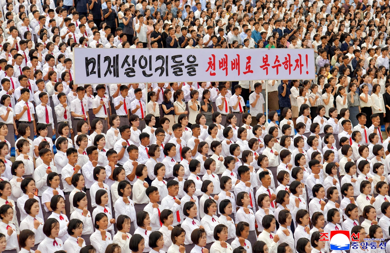 This photo, released by the Korean Central News Agency, shows a youth rally held at the Youth Park Open-Air Theater in Pyongyang on Wednesday to mark the “Day of Anti-US Struggle.” (Yonhap)