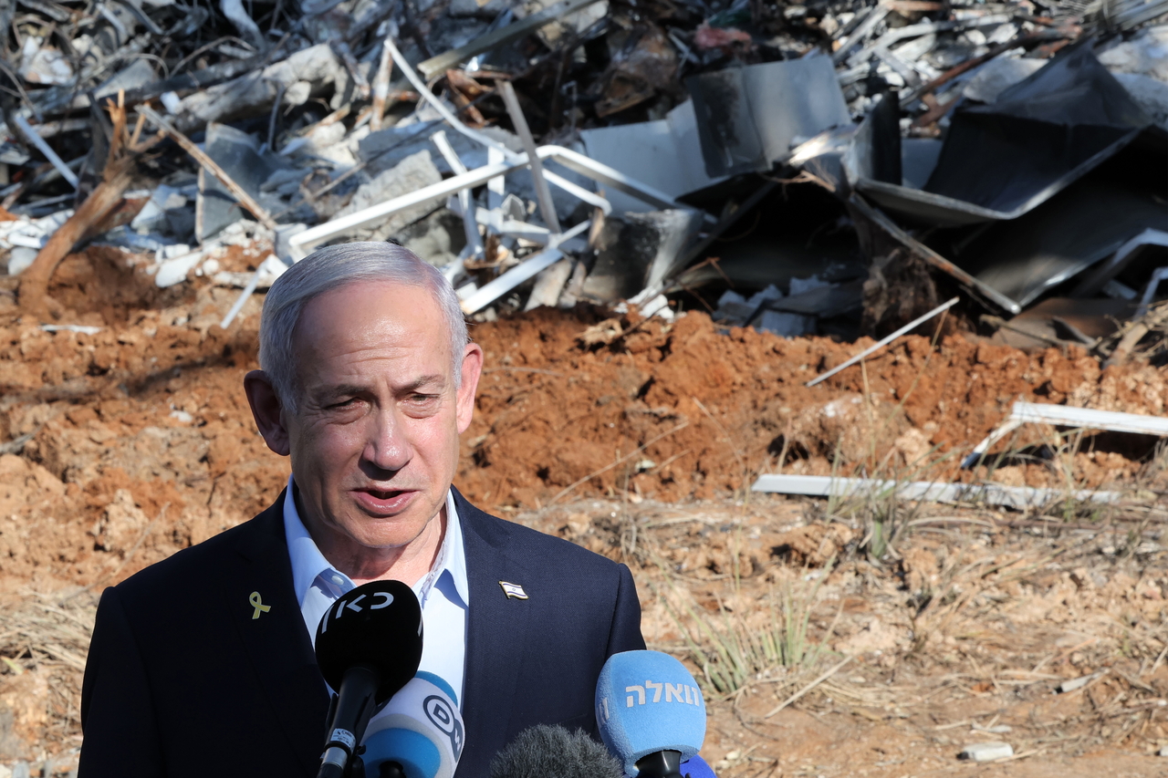Israel's Prime Minister Benjamin Netanyahu speaks to the press during a damaged site in Rehovot, Israel, June 20. (EPA-Yonhap)