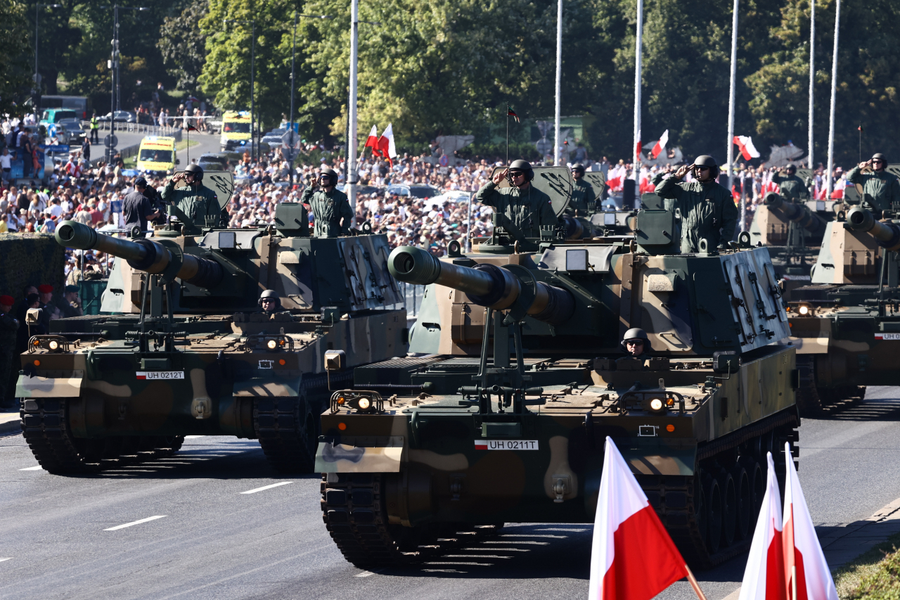 K9 howitzers produced by South Korea’s Hanwha Aerospace parade down the street for Armed Forces Day in Warsaw, Poland, on Aug. 15, 2023. (Getty Images)