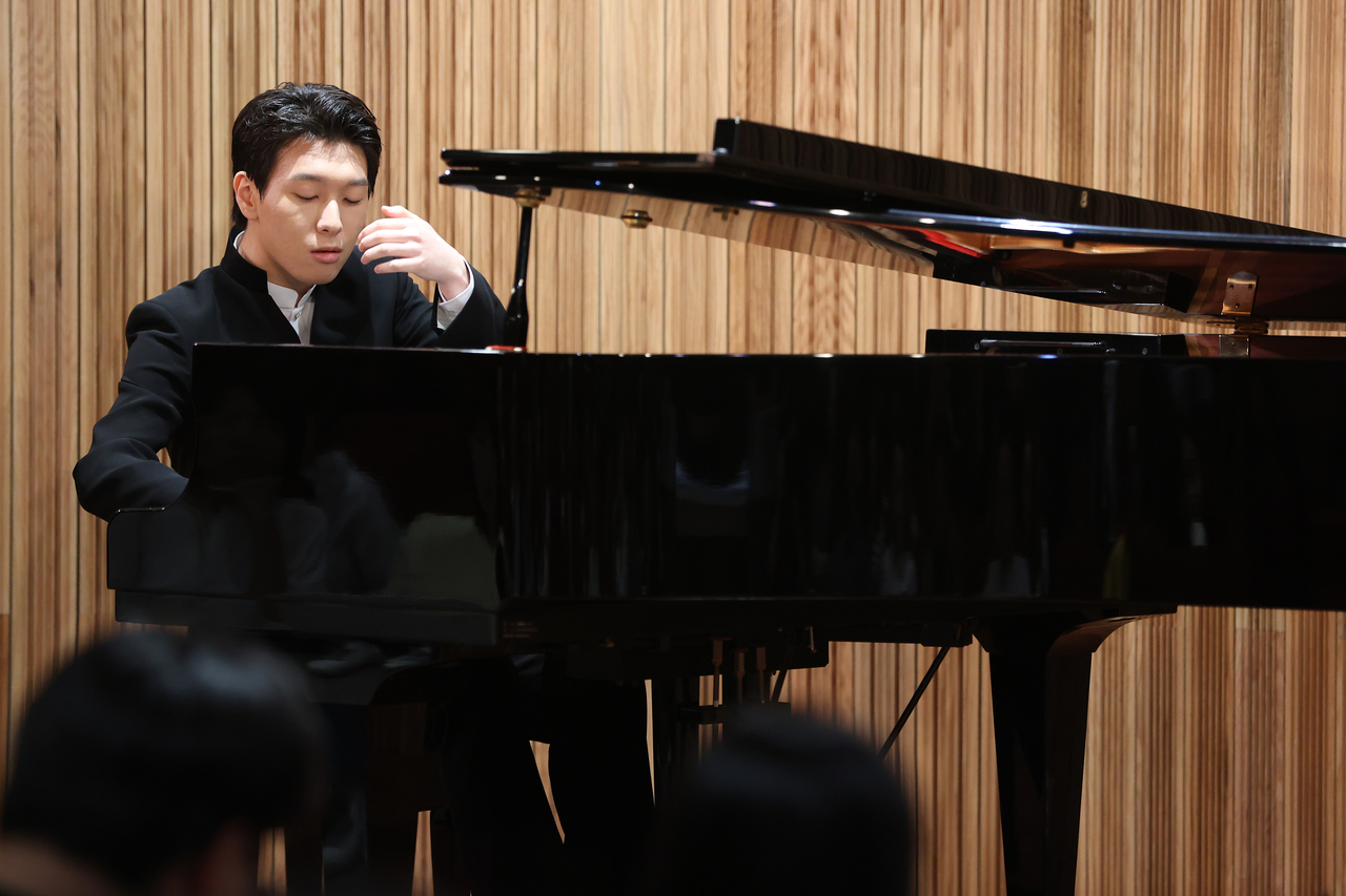 Pianist Kim Saehyun participates in a press conference in Seoul on Thursday. (Yonhap)