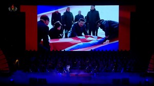 N. Korean leader flaunts Russia ties from battlefield to stage