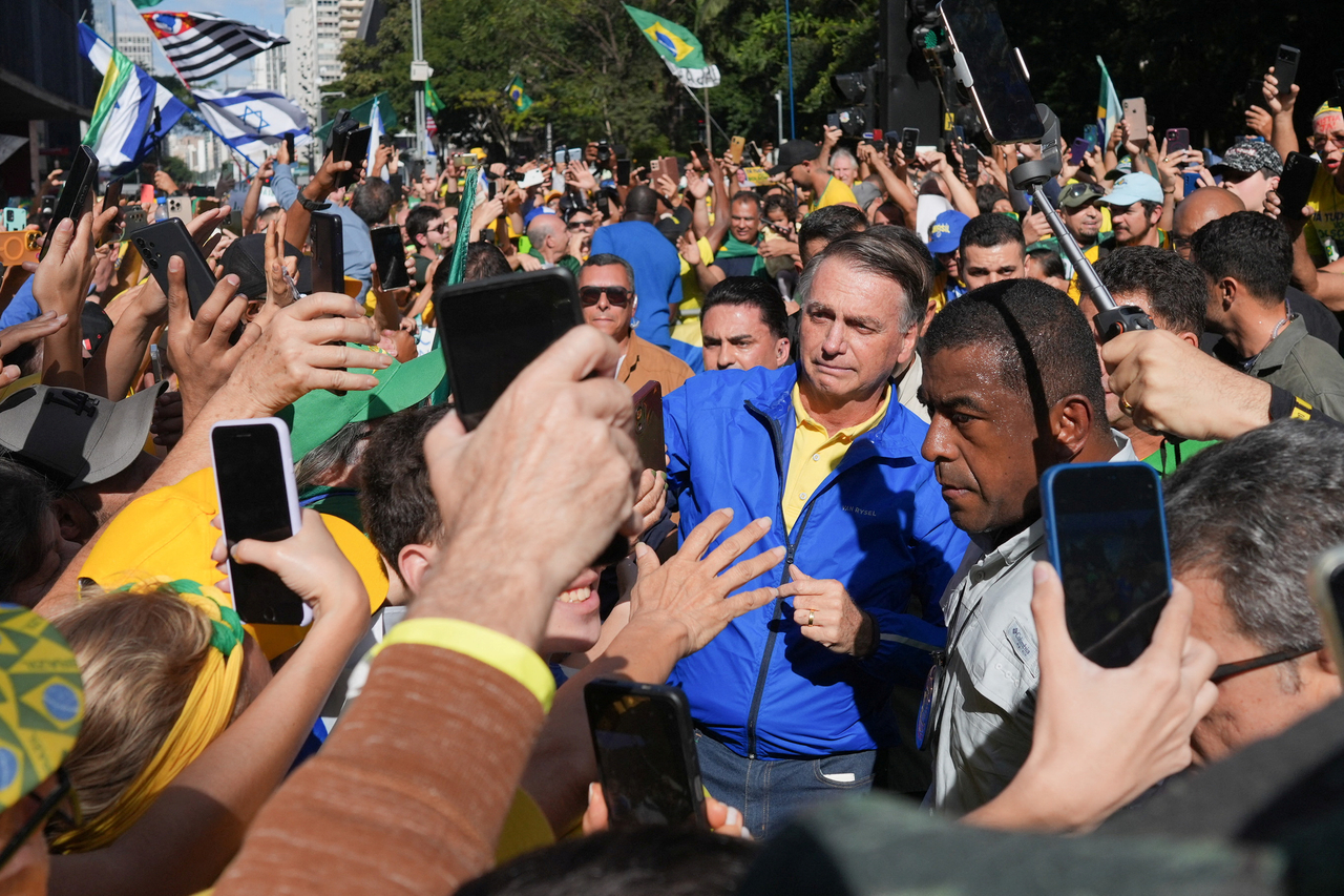 Former Brazilian President Jair Bolsonaro interacts with supporters in Sao Paulo, Sunday. (Reuters-Yonhap)