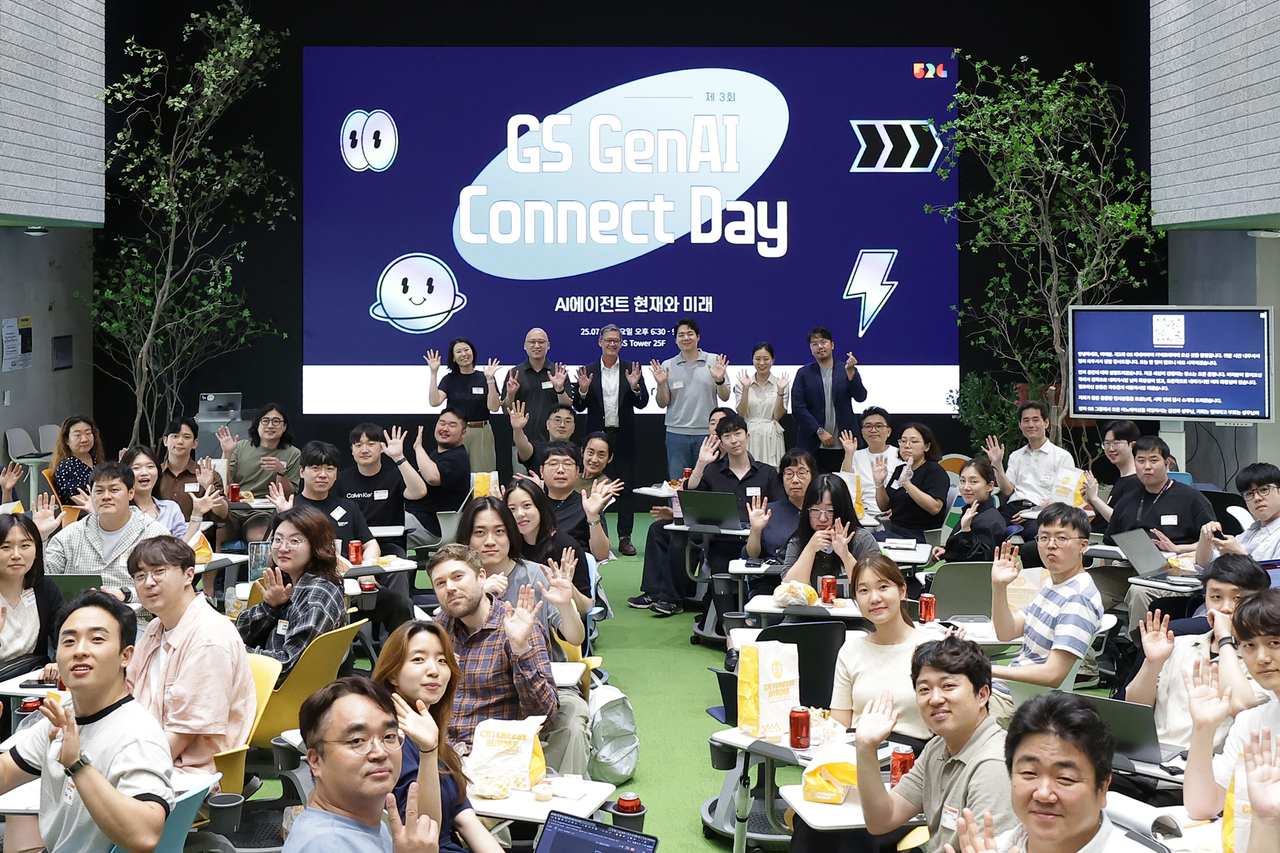 Speakers and participants pose for a commemorative photo during GenAI Connect Day, held at GS Tower in Seoul’s Gangnam-gu on Tuesday. (GS Group)
