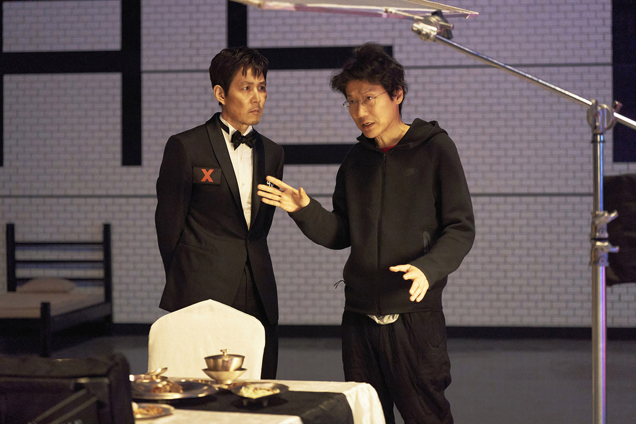 Lee Jung-jae (left) and director Hwang Dong-hyuk on set of "Squid Game" Season 3 (Netflix)