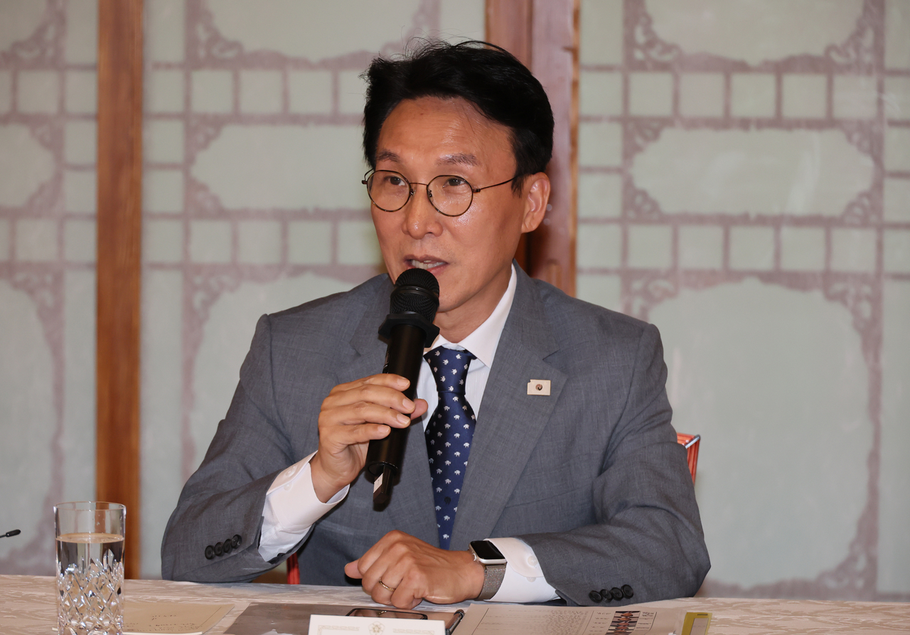 Prime Minister Kim Min-seok speaks at the high-level party-government meeting held at the Prime Minister’s official residence in Jongno-gu, Seoul, on Sunday. (Yonhap)