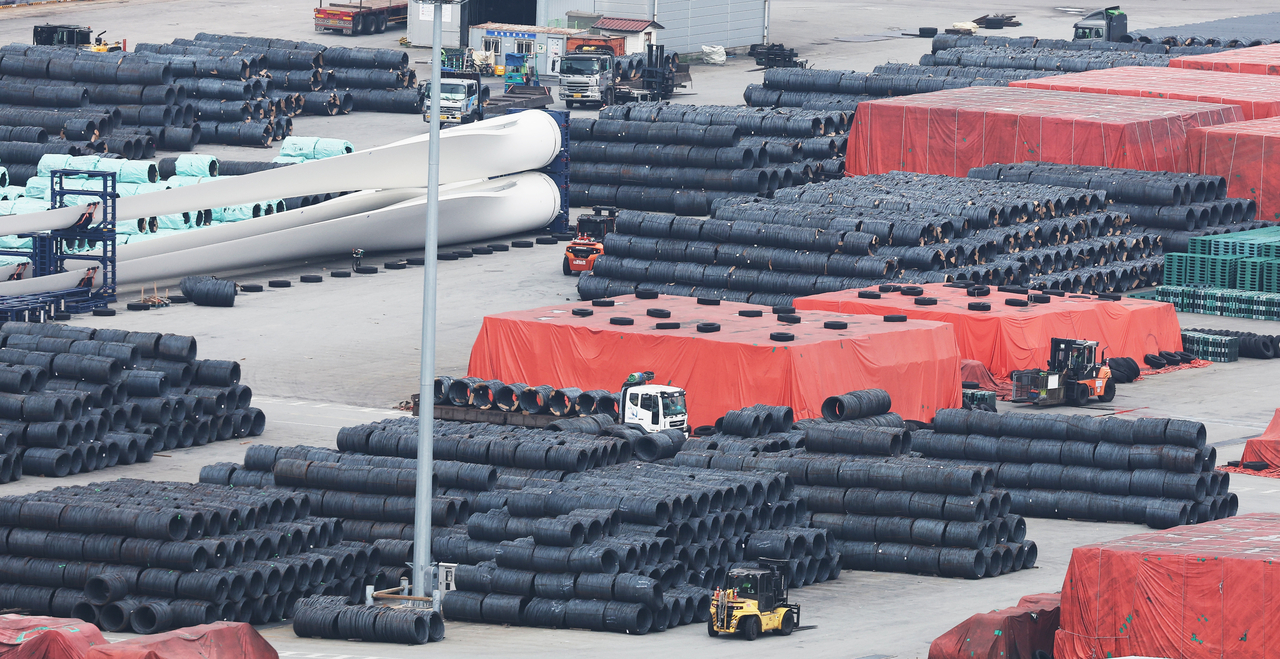 Steel products wait to be shipped for export at a port in Pyeongtaek, about 65 kilometers south of Seoul. (Yonhap)